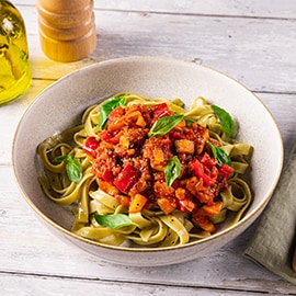 Pasta met kip met geroosterde paprika en courgette